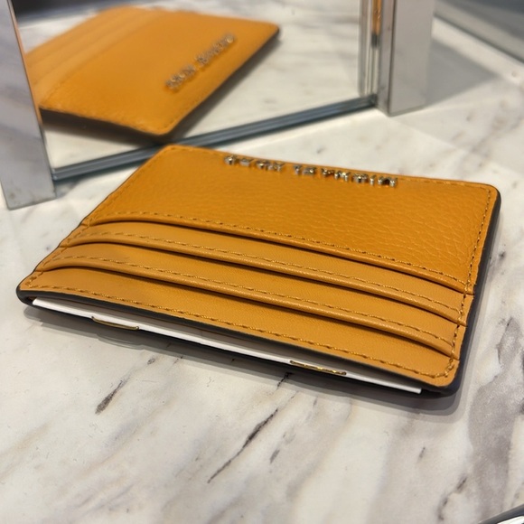 MICHAEL KORS
Large Pebbled Leather Card Holder Case
Cider
NWT - Picture 6 of 16